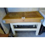 An early 20c butcher's block on painted stand est: £200-£400