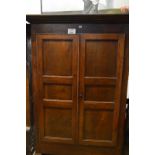 A 19c French possibly cherry wood armoire with two large panelled doors est: £120-£160