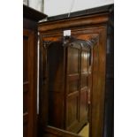 A Victorian flame mahogany mirrored wardrobe with a large door over a single drawer est: £60-£80