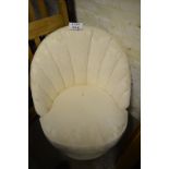 A 1930's style cream upholstered bedroom chair est: £30-£50