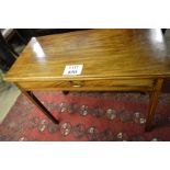 A 19c mahogany turn over tea table with a long frieze drawer and brass handle est: £80-£120