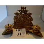 A decorative late 19th century continental rococo brass desk set comprising letter rack and twin