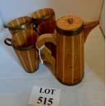 A set of four wooden beer or lemonade beakers and jug est: £30-£50 (F6)