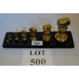 A set of seven brass weight est: £25-£35 (N3)