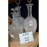 A pair of 19th century cut glass decanters and a mallet shaped decanter (stoppers associated) est: