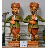 A pair of decorative polychrome carved wooden Indian drummer figures (62 cm high approx) est: