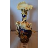 A large decorative bottle neck vase decorated with mythical figure est: £30-£50 (E)