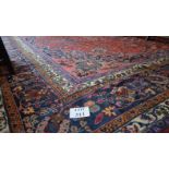 A large mid 20c Persian carpet (17' 6" x 11' 10" approx) est: £400-£600