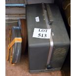 A vintage Bell & Howell film  projector and two cased reels est: £30-£50 (BF27)