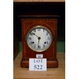 An Edwardian mahogany cased mantle clock with string inlay est: £40-£60 (F17)