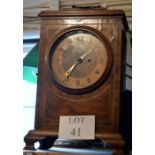 An early 20c mahogany cased mantel clock with chiming movement est: £50-£100 (G1)