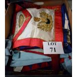 A box containing numerous old Mason's aprons,