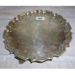 A silver salver with pie crust edge London 1917 est: £280-£380