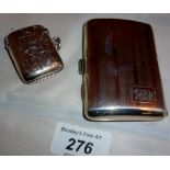 A silver engraved vesta case Birmingham 1899 and a silver cigarette case Birmingham 1925 est: