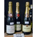 Three bottles of Champagne one Moet & Chandon,