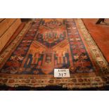 An old Persian rug (86 x 142 cm approx) est: £35-£55