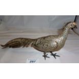 A white metal model of pheasants marks on tail feathers est: £80-£120