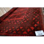 A fine Persian carpet on red ground (slightly a/f) (290 x 230 cm approx) est|: £100-£150