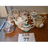A collection of ten miniature porcelain teapots est: £30-£50 (N3)