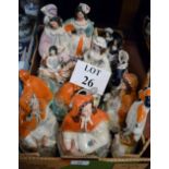 Five Staffordshire figurines depicting a seated girl in orange cloak with animal (some a/f) and ten