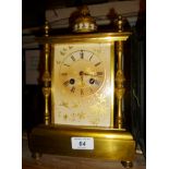 An early 20c gilt mantel clock with deco