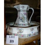 A decorative floral printed toilet jug a