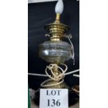 A Victorian oil lamp converted to electr