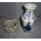 A blue and white Chinese vase and a ring