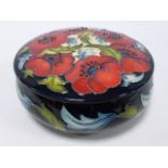 Moorcroft lidded bowl, red flower and fo