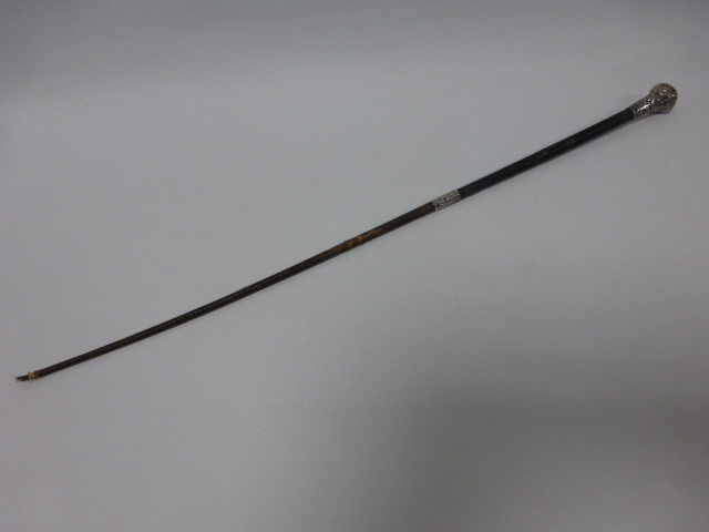 Riding Crop with white metal mounts and