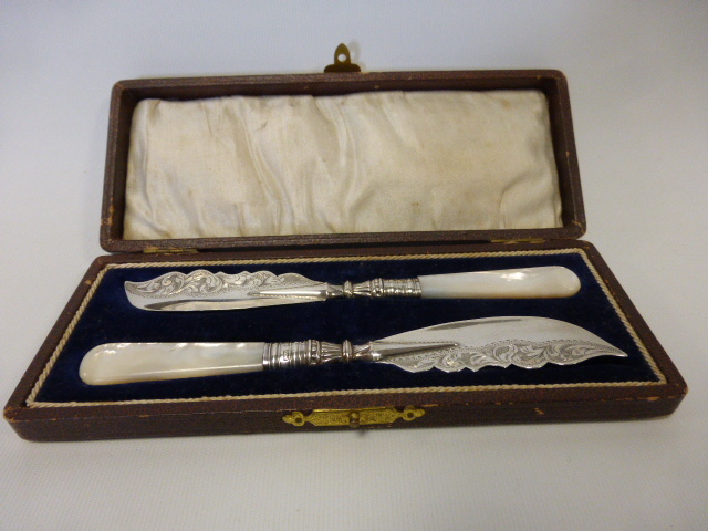 Pair of silver bladed fish knives with m