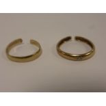 Two 9ct gold toe rings, one set with a s