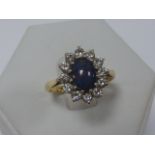 An 18ct gold Opal and Diamond ring, full