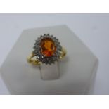 An 18ct gold Fire Opal and Diamond ring,