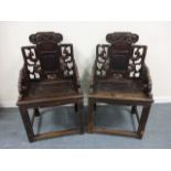 Pair of Chinese chairs with decorative c