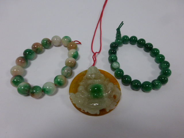 Two Jade bead elasticated bracelets toge