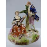 Porcelain figural group, man & woman in