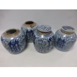 Four Chinese bulbous jars with blue & wh