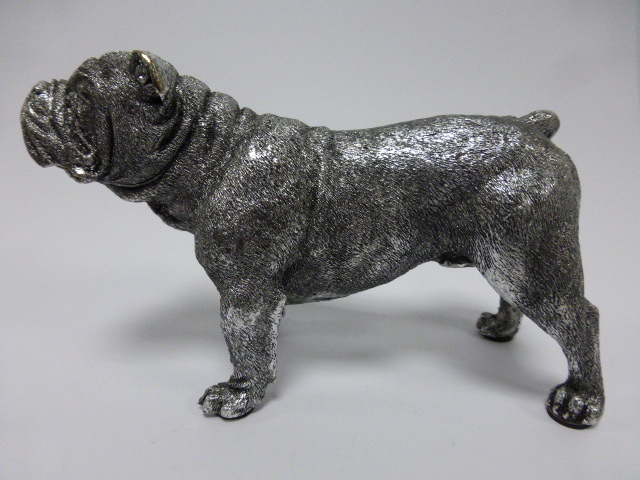 A well modelled silvered Bulldog, unmarked, 13.5cms in length CONDITION REPORT: Small chip to