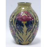 Moorcroft vase, red, yellow & blue flowe