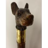 Gentleman's walking cane with well carve