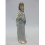 Lladro figure 'Girl standing with Lilies