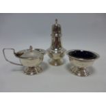 Three piece silver cruet set, hallmarked London 1966, makers initials JJ in script, total