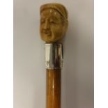 Walking cane with carved bone knop in th