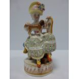 Meissen figure of a girl with a lap dog