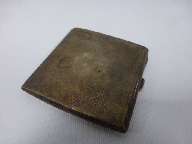 Silver cigarette case with engine turned