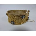 Vintage Boucher mesh bracelet with applied floral stone set decoration,