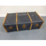 Vintage twin handled wooden bound travelling trunk, from the estate of RAF Flight Officer G.