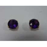 9ct gold Amethyst stud earrings with butterfly backs, 8.