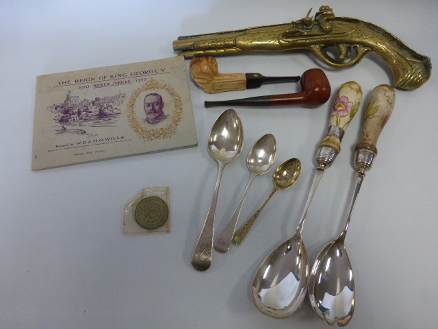 An eclectic mix of items to items two Georgian silver spoons, plated items,